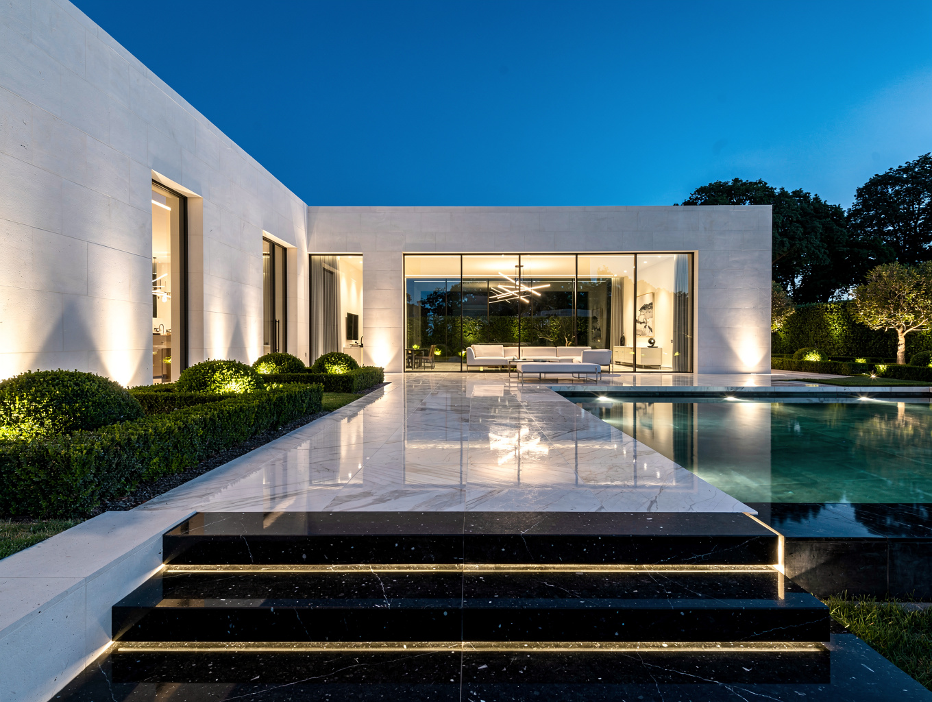Modern luxury architectural estate with expansive glass facades